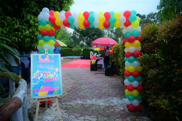 Colourful balloon arch at the event entrance